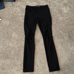 Black stretch high wasted distressed jegging from express, size 4. Super comfy